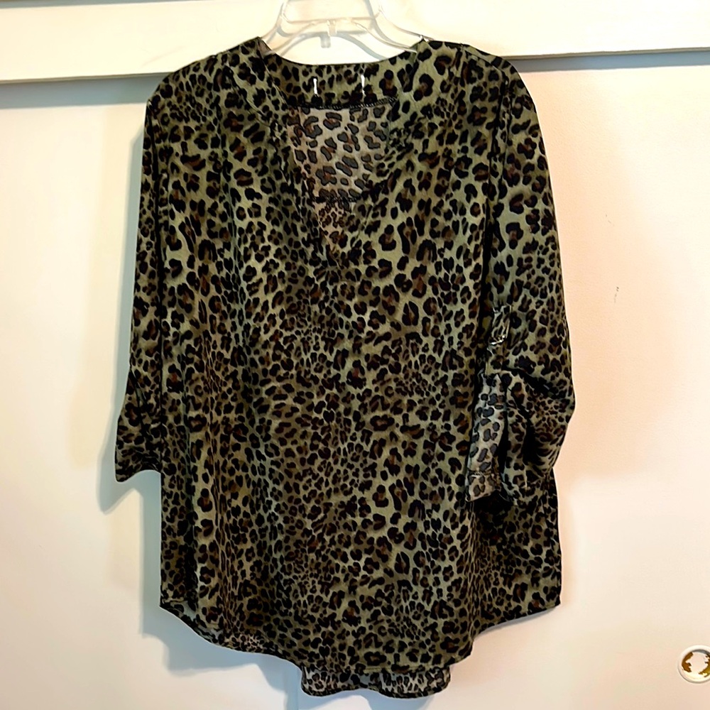 Roswear Leopard Print V-Neck Blouse with buckle up 3/4 sleeves.